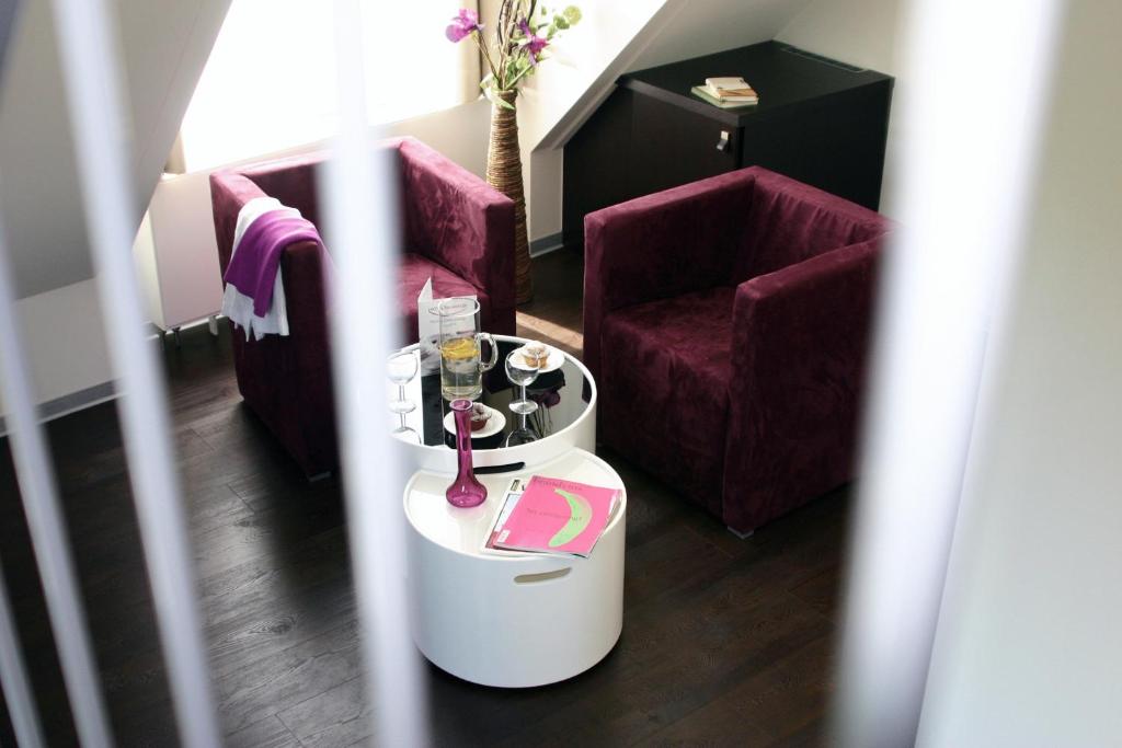 Posezení v ubytování Hotel zur Promenade