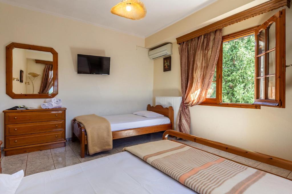 Postel nebo postele na pokoji v ubytování San Giorgio Villa
