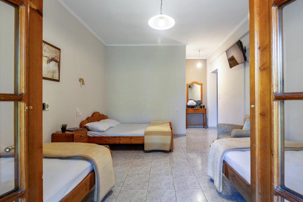 Postel nebo postele na pokoji v ubytování San Giorgio Villa