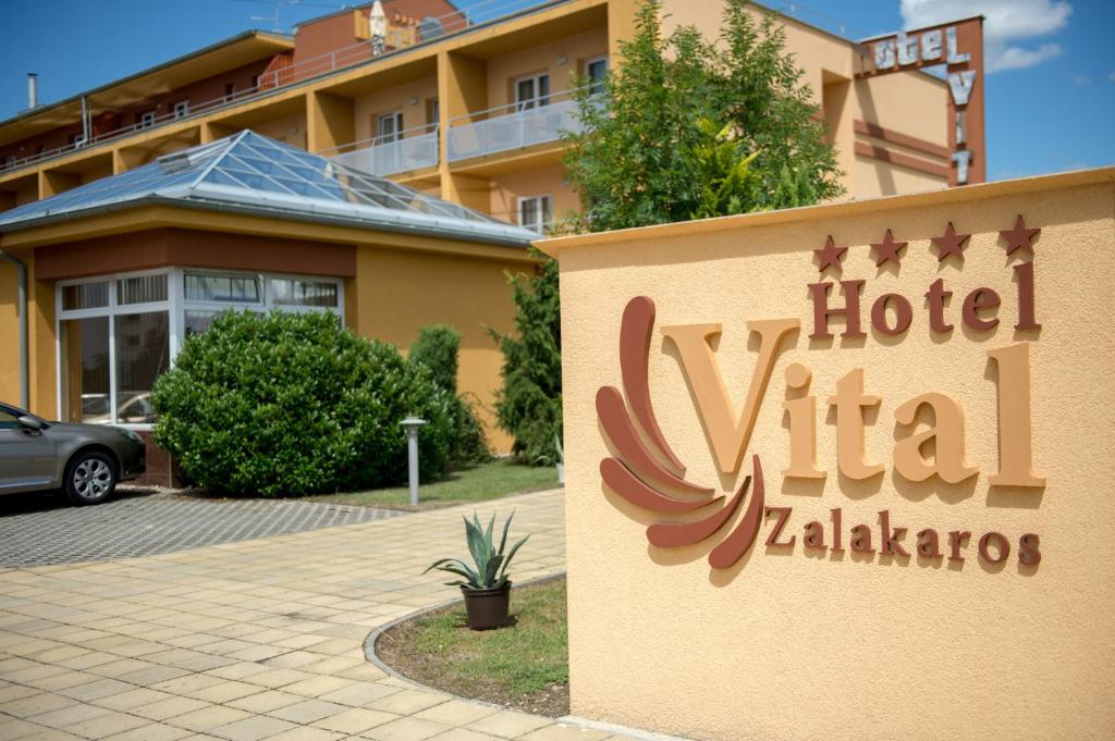 a sign for a hotel villa talmadge at Hotel Vital in Zalakaros