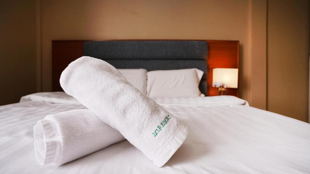 Postel nebo postele na pokoji v ubytování J.G. Resort