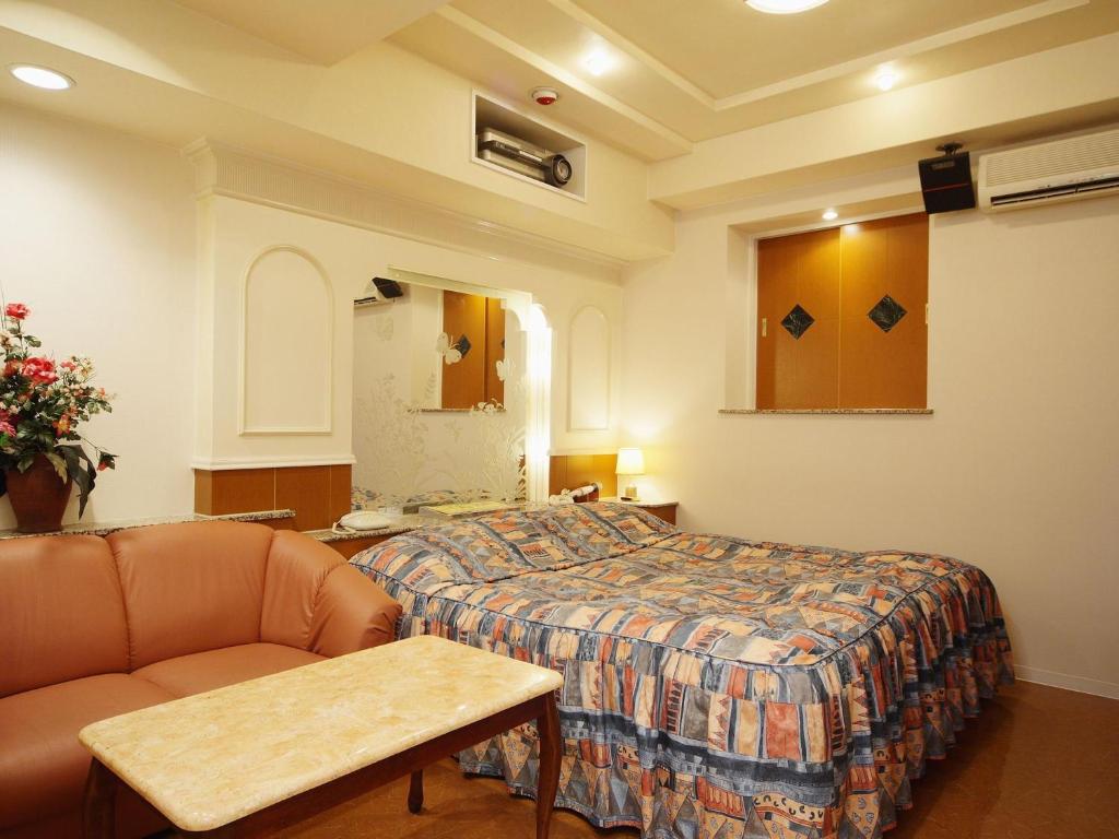 Postel nebo postele na pokoji v ubytování Hotel Fine Misaki