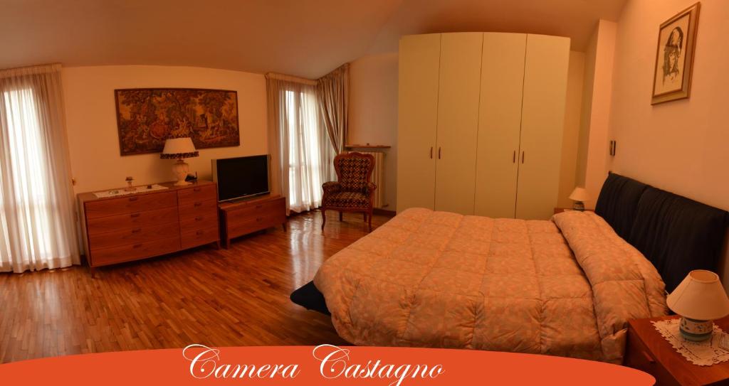 מיטה או מיטות בחדר ב-Villa Silvia