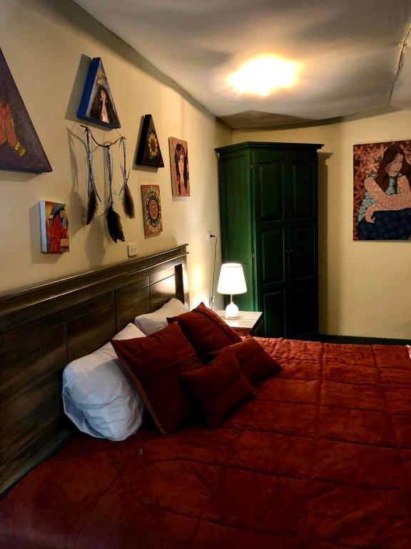 Postel nebo postele na pokoji v ubytování Cosmos Chill - Suite con jacuzzi y acuario
