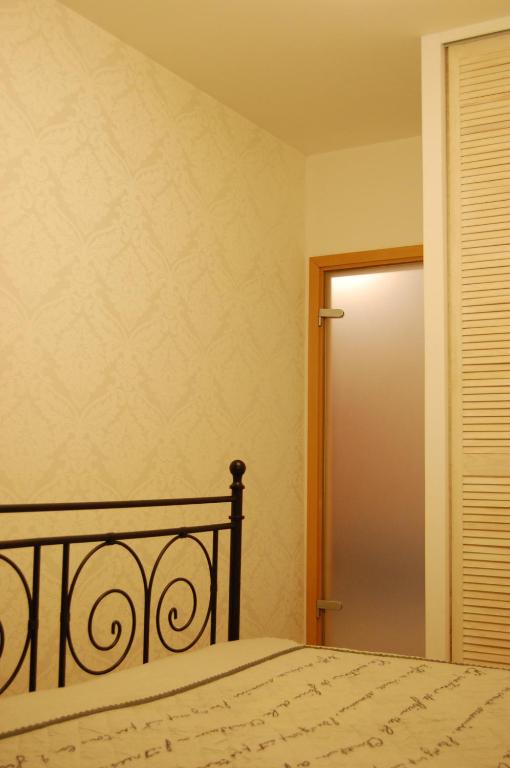 Posteľ alebo postele v izbe v ubytovaní Apartament Bobrowiecka