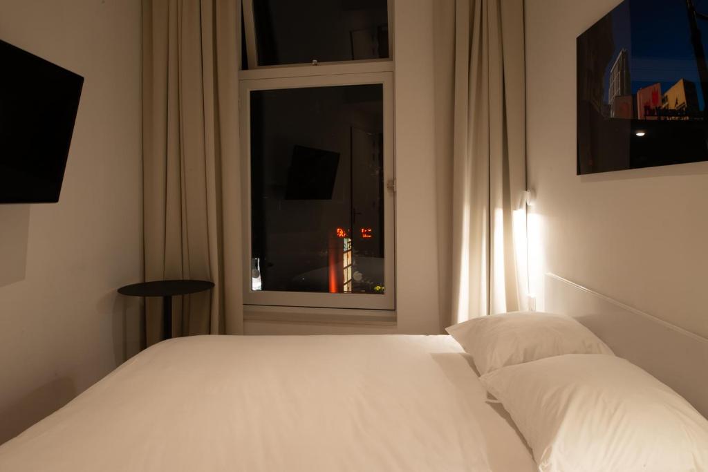 Postel nebo postele na pokoji v ubytování Hotel 171