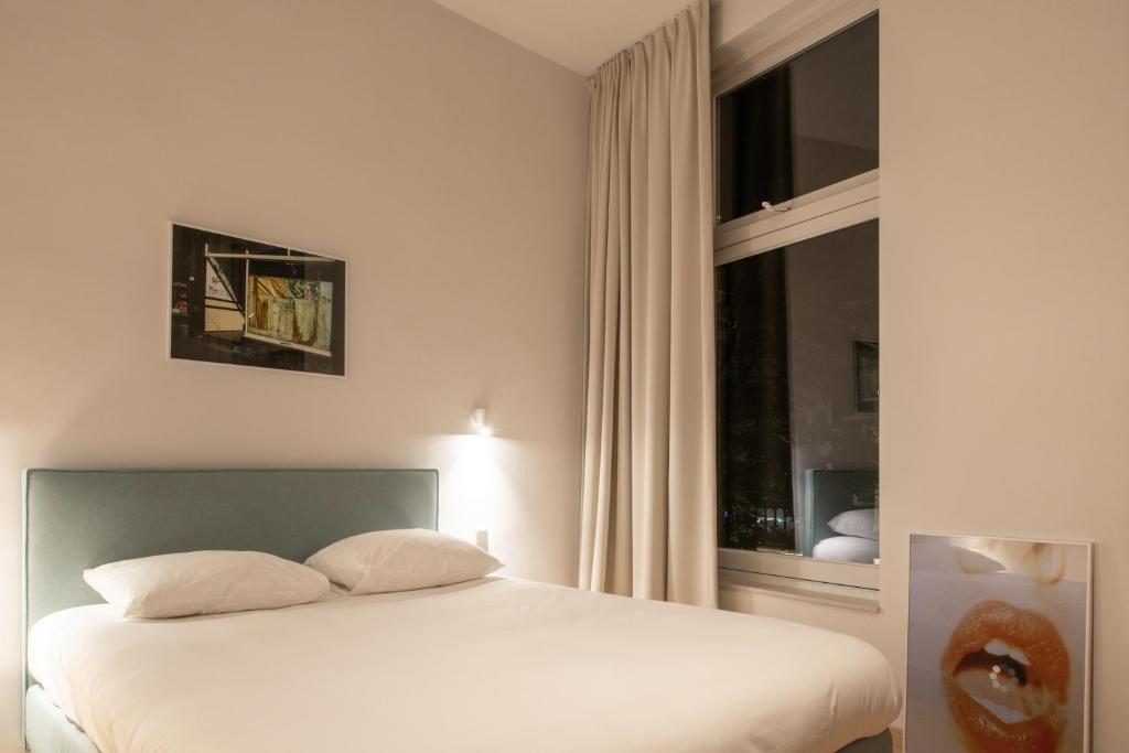 Postel nebo postele na pokoji v ubytování Hotel 171