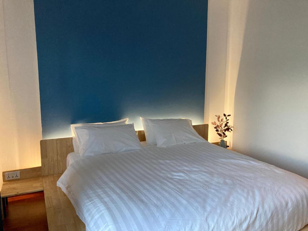 Postel nebo postele na pokoji v ubytování Moocoworking