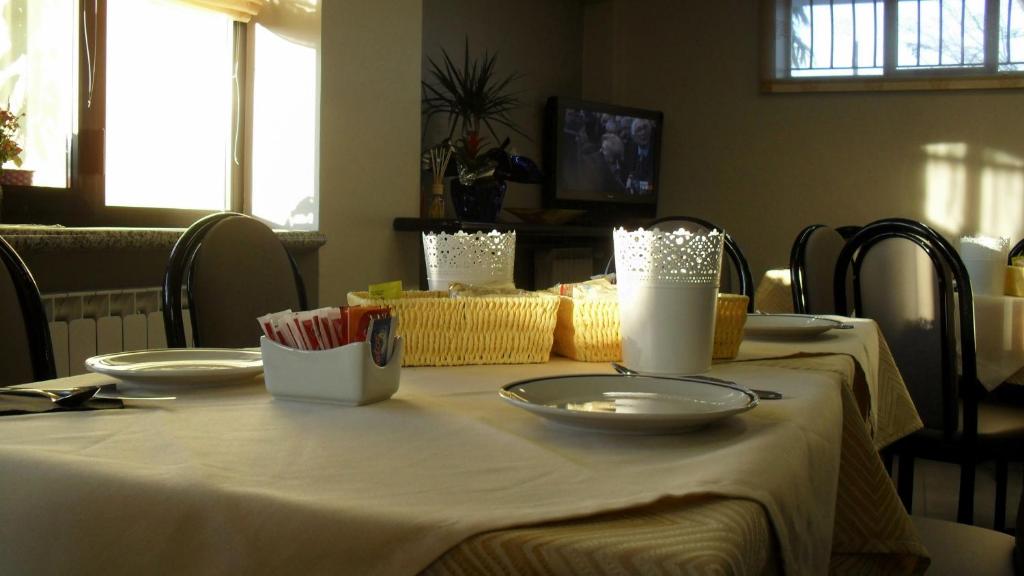 TV a/nebo společenská místnost v ubytování Albergo Residence Isotta