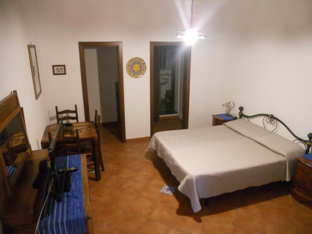 Postel nebo postele na pokoji v ubytování Pedra Residence