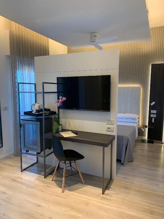 TV a/nebo společenská místnost v ubytování Hotel Gardenia