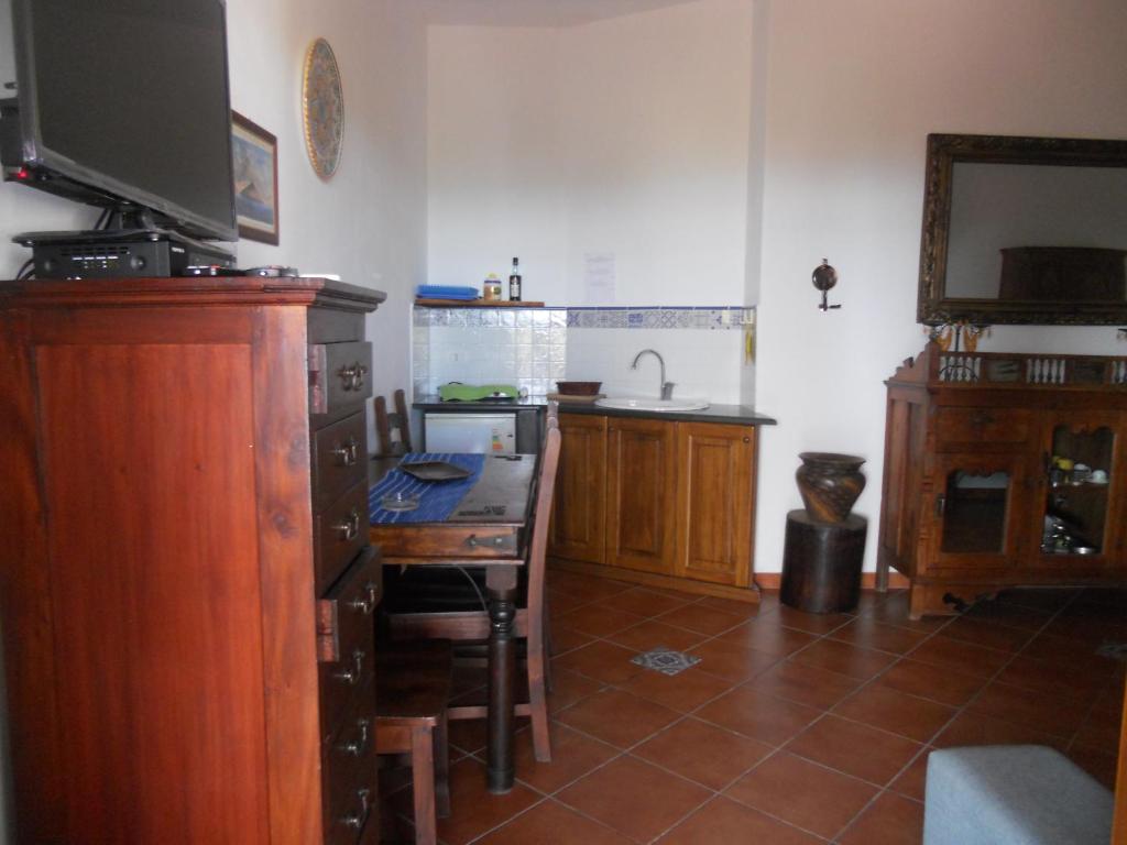 Kuchyň nebo kuchyňský kout v ubytování Pedra Residence