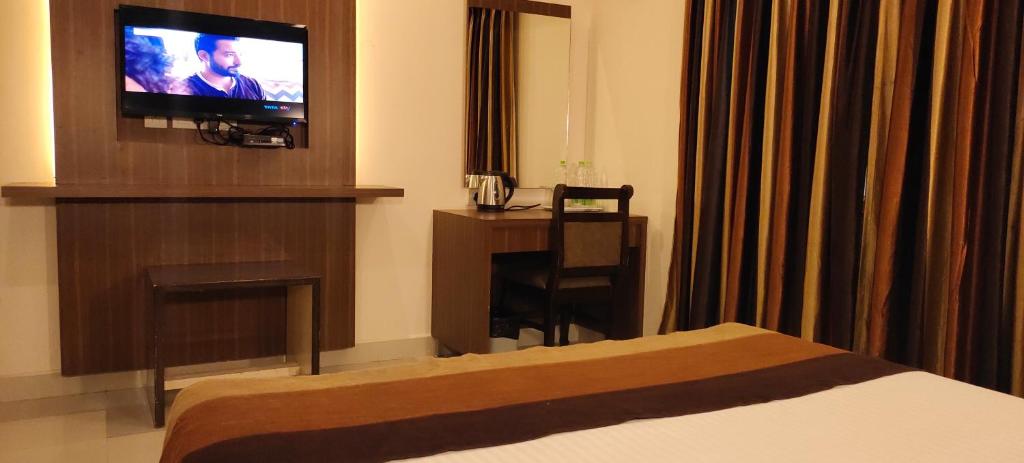 TV a/nebo společenská místnost v ubytování Hotel Deepam