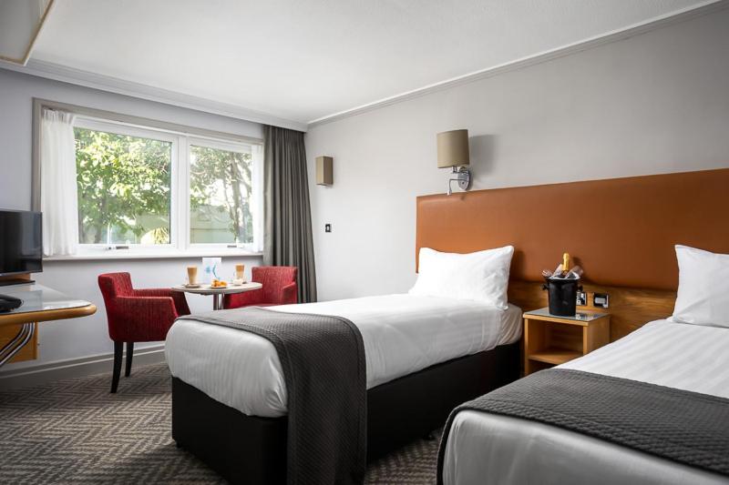 Krevet ili kreveti u jedinici u okviru objekta Langstone Quays Resort