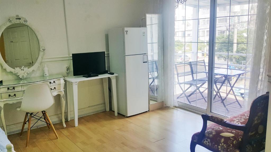 Kuchyň nebo kuchyňský kout v ubytování Bella Guesthouse