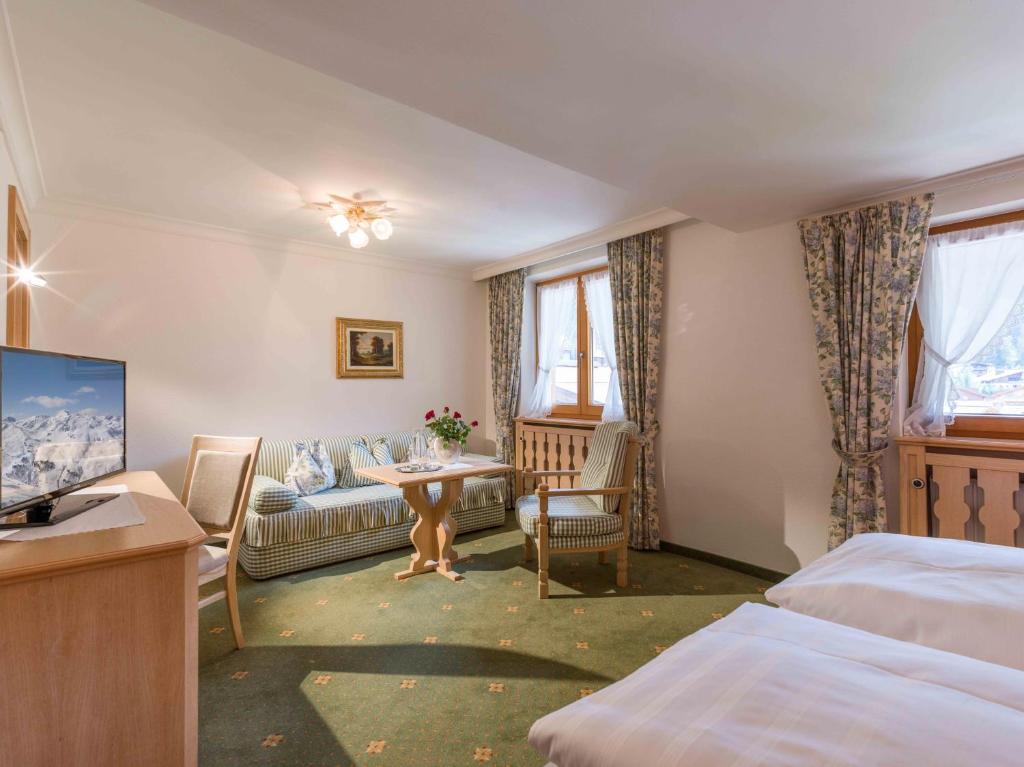 Postel nebo postele na pokoji v ubytování Hotel Antonius