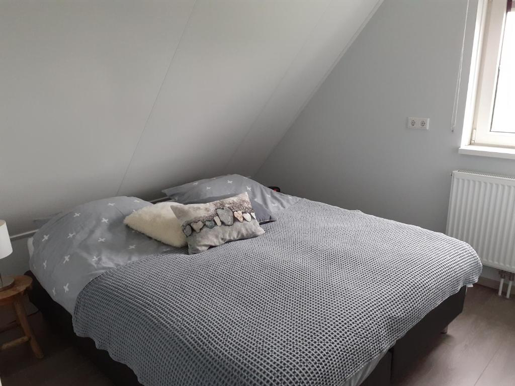 Postel nebo postele na pokoji v ubytování An en Bie