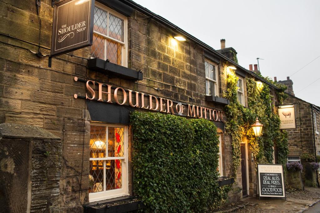 a building with a sign on the side of it at Shoulder of Mutton Inn in Harrogate