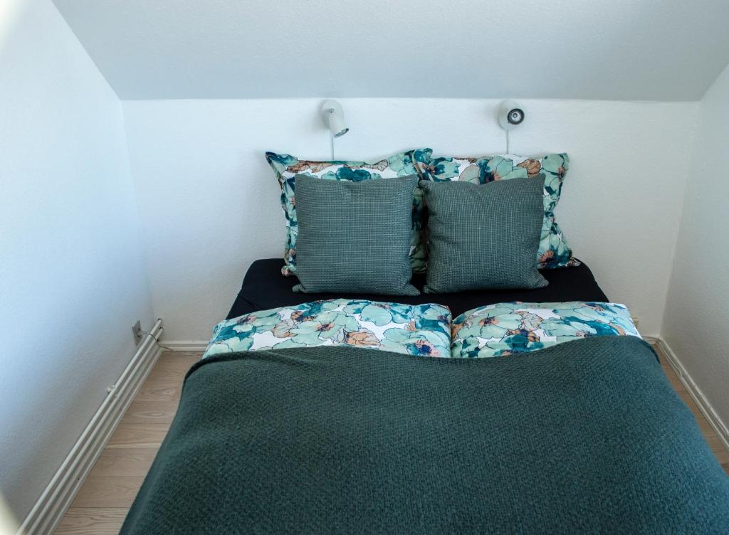 Postel nebo postele na pokoji v ubytování Samsø Perlen