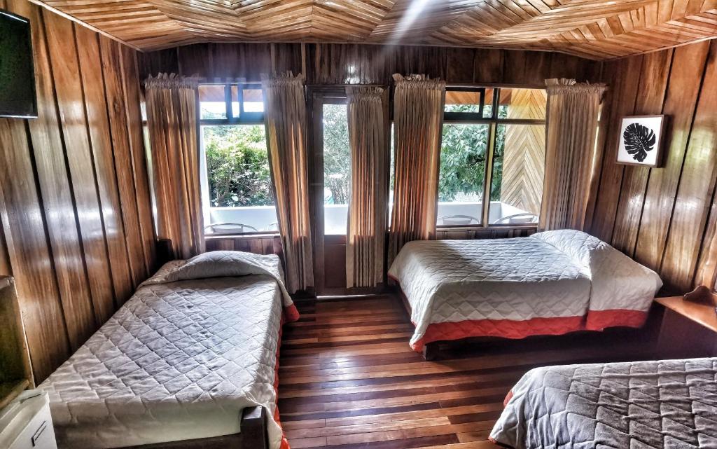 Postel nebo postele na pokoji v ubytování Hotel Don Taco