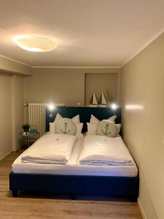Postel nebo postele na pokoji v ubytování Haus am See