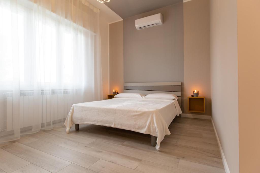 Postel nebo postele na pokoji v ubytování Relax nel Verde