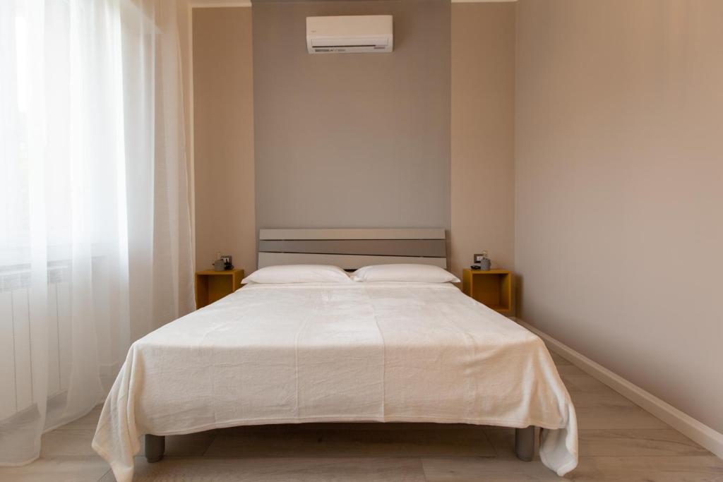 Postel nebo postele na pokoji v ubytování Relax nel Verde