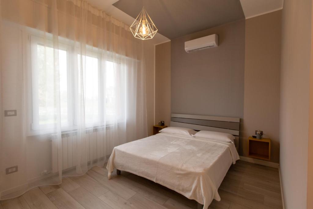 Postel nebo postele na pokoji v ubytování Relax nel Verde