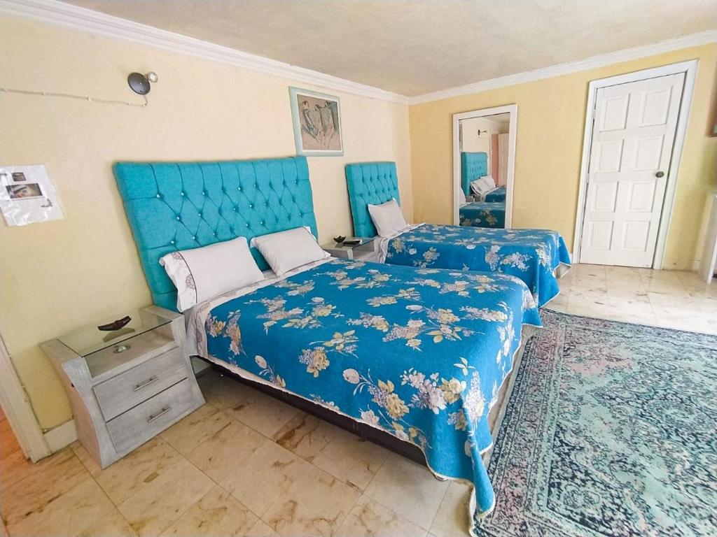 Una cama o camas en una habitación de Casa Isabella