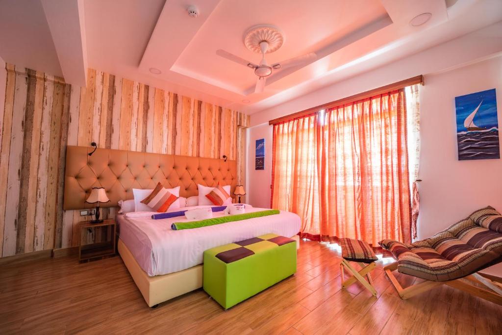 Postel nebo postele na pokoji v ubytování Rosy Villa Hotel
