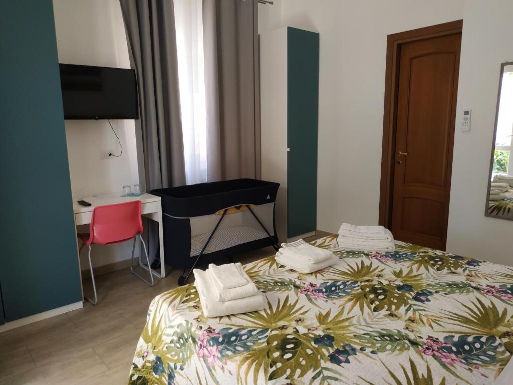 Posteľ alebo postele v izbe v ubytovaní un passo dal mare