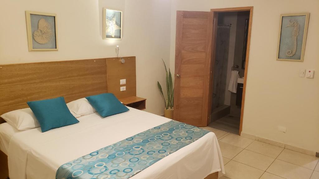 Postel nebo postele na pokoji v ubytování Hotel Agua Dulce