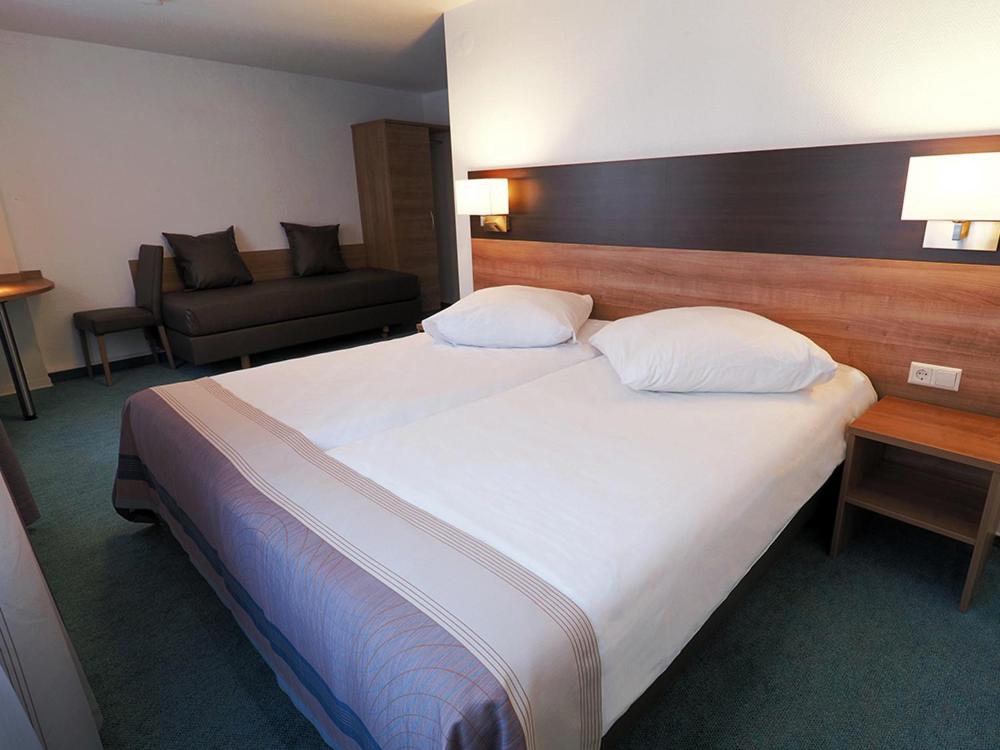 Hotel Goldener Hirsch Mosbach - Comfort Triple Room