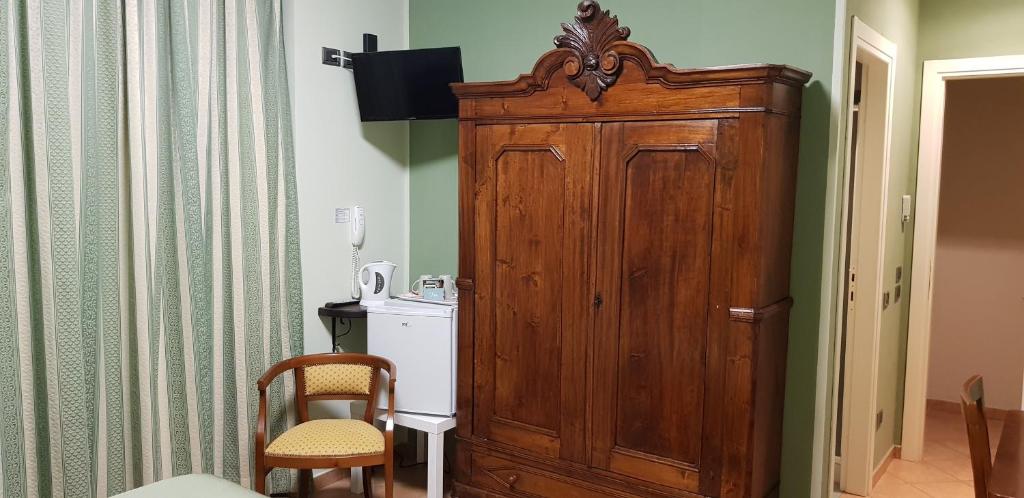 TV a/nebo společenská místnost v ubytování La Regibussa - Hotel Ristorante