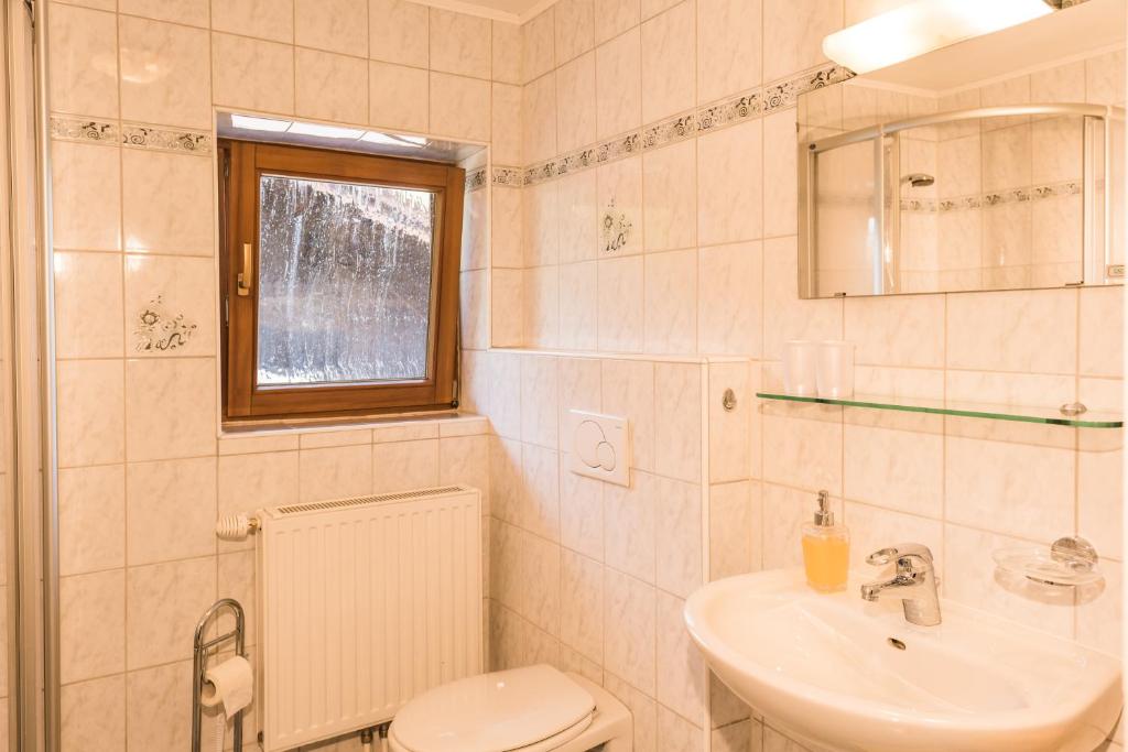 Koupelna v ubytování Kerschbaumergut