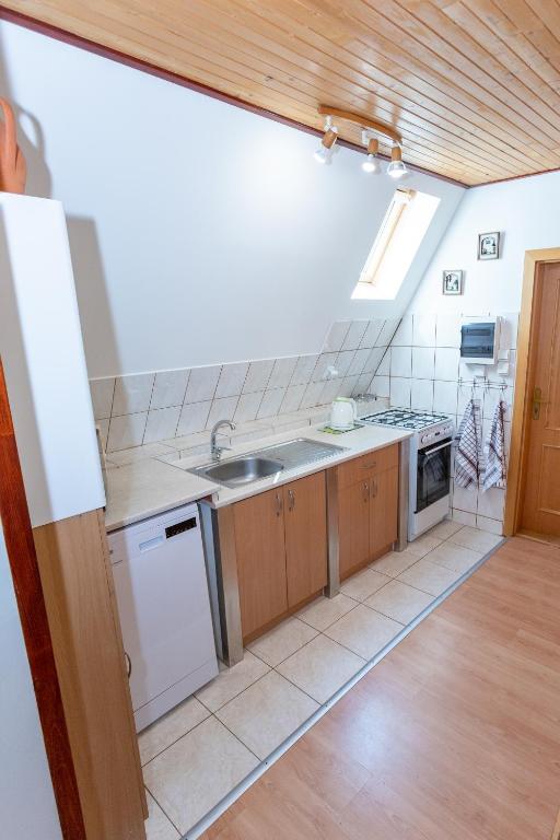 Kuchyň nebo kuchyňský kout v ubytování Horsky dom