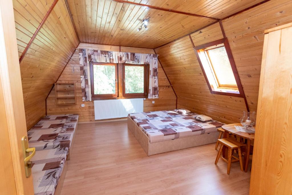 Postel nebo postele na pokoji v ubytování Horsky dom