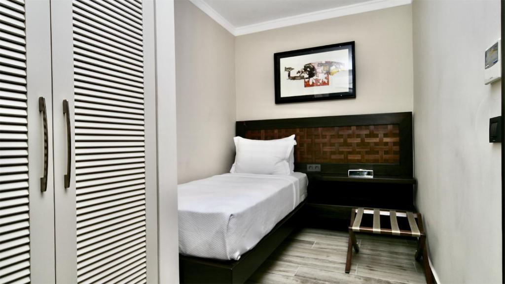 Postel nebo postele na pokoji v ubytování Resa Hotel Göcek