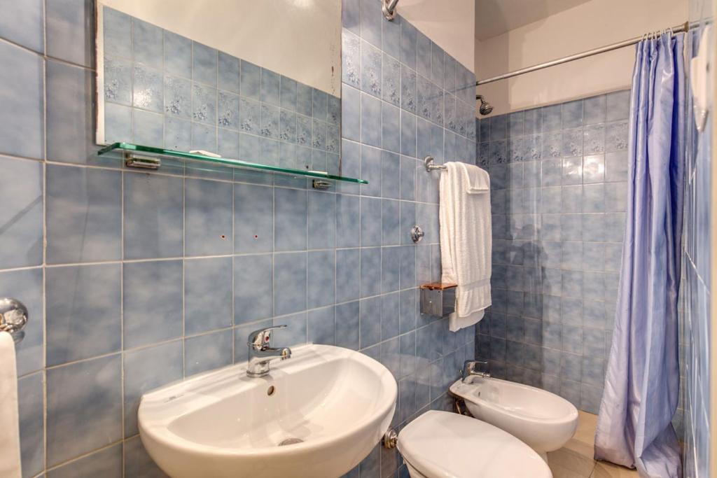 Koupelna v ubytování Hotel Romagna