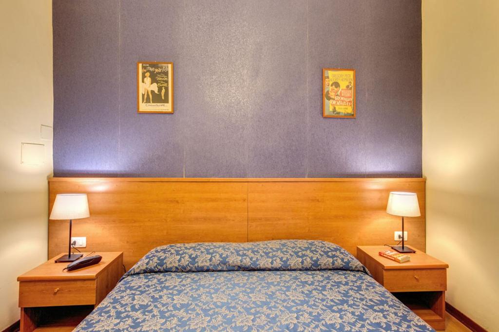 Postel nebo postele na pokoji v ubytování Hotel Romagna