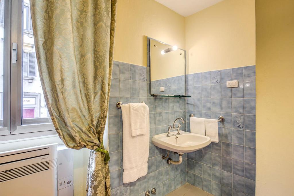 Koupelna v ubytování Hotel Romagna