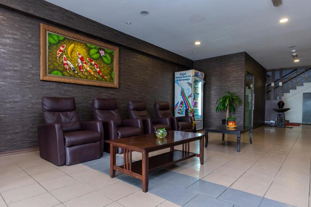 Posezení v ubytování I Harmony Hotel