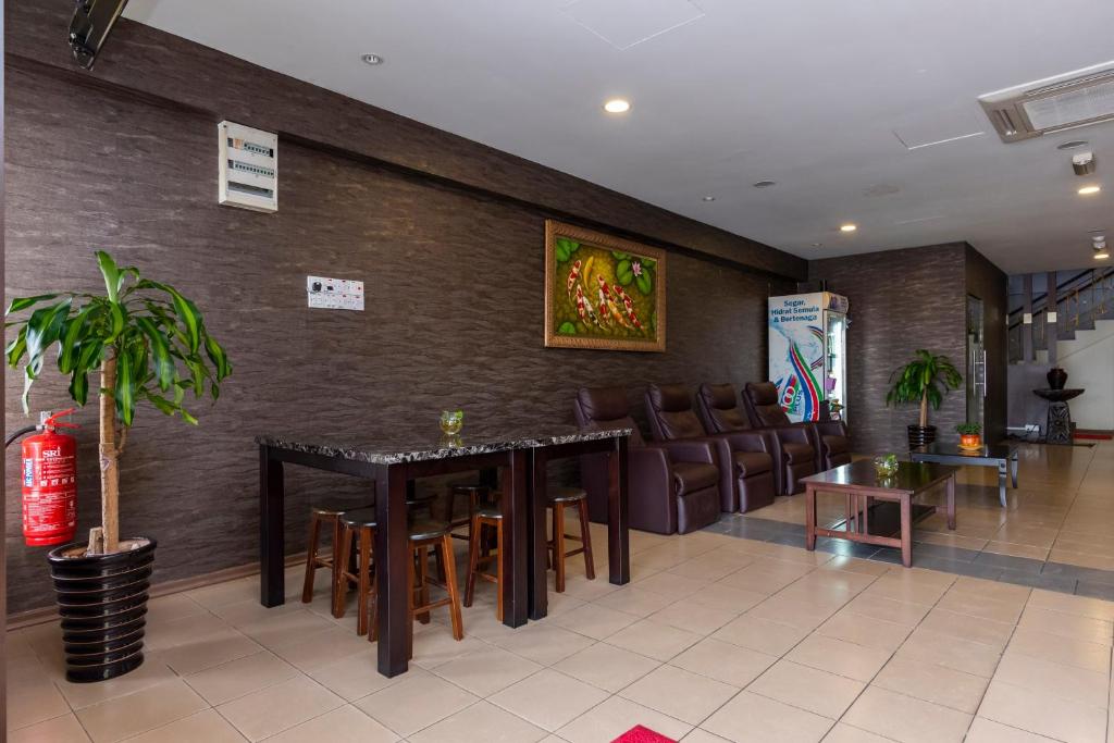 Posezení v ubytování I Harmony Hotel