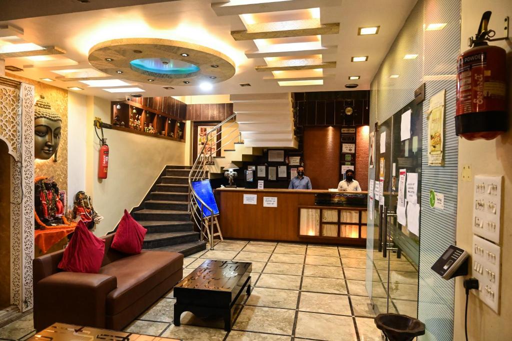 A área de receção ou átrio de Hotel Heritage Inn at Assi Ghat