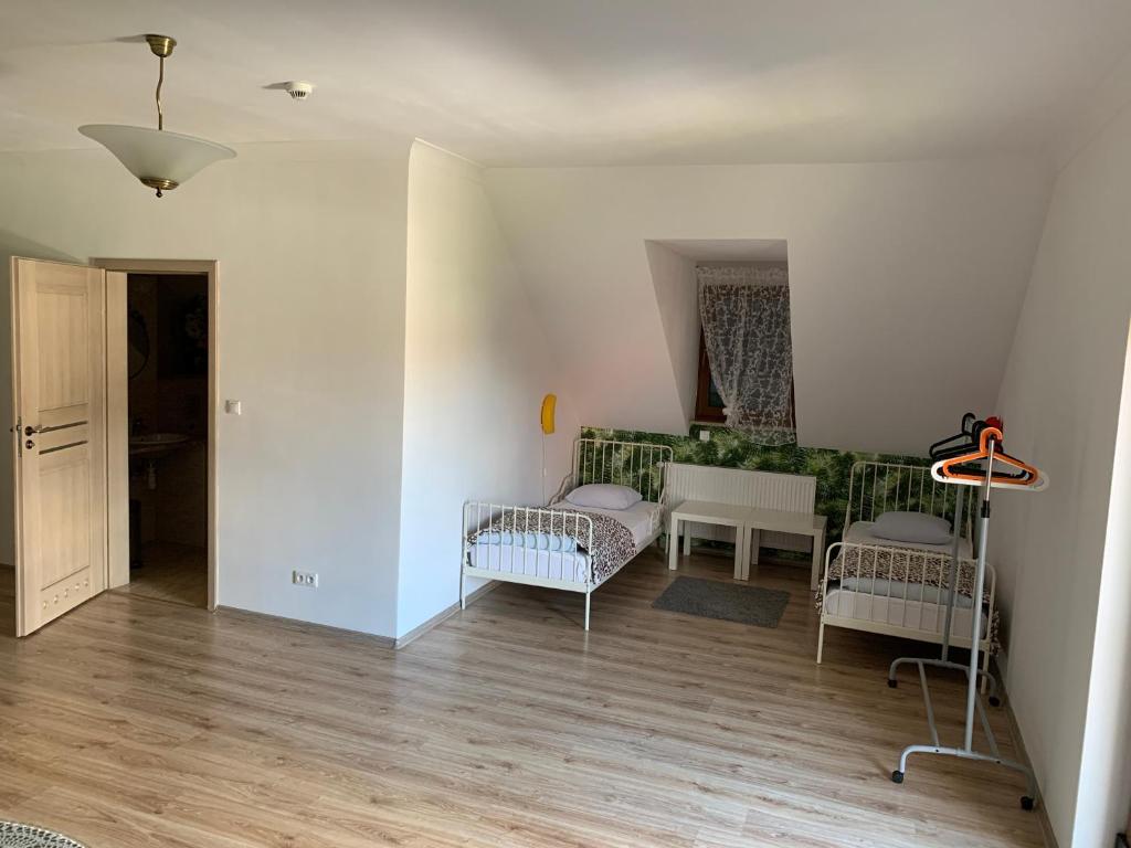 Łóżko lub łóżka w pokoju w obiekcie Motel u Olka Boczów