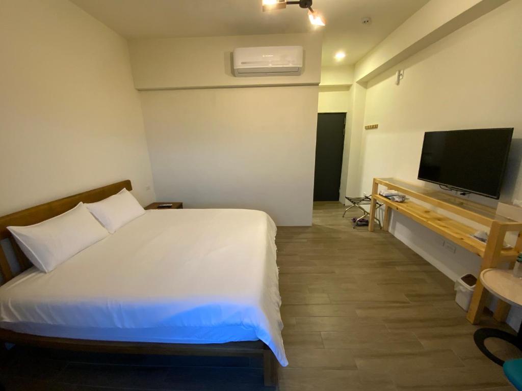 Postel nebo postele na pokoji v ubytování Grain Educator Home