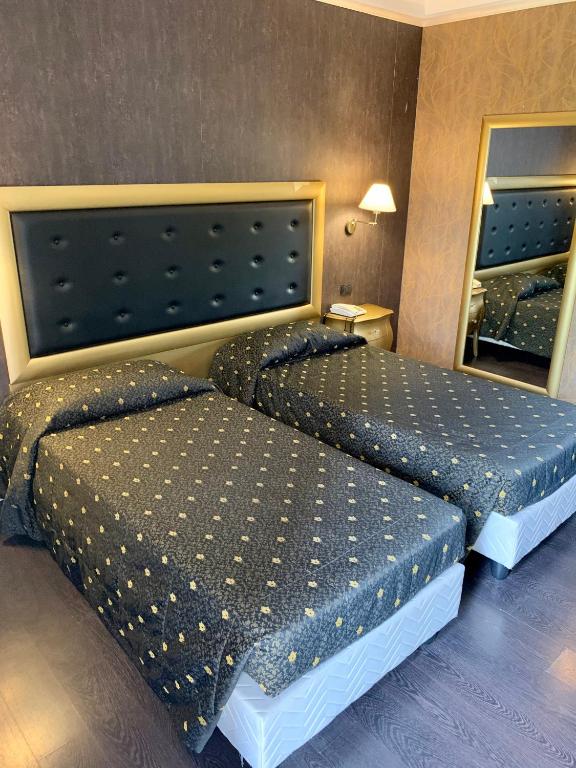 Postel nebo postele na pokoji v ubytování Hotel - Motel Flower