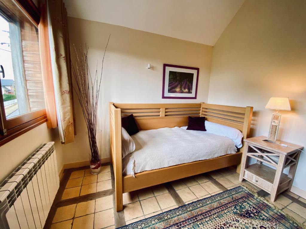 Postel nebo postele na pokoji v ubytování L’antilope