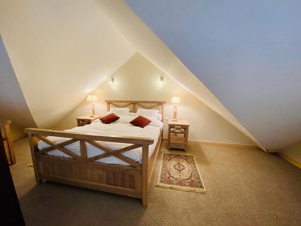 Postel nebo postele na pokoji v ubytování L’antilope