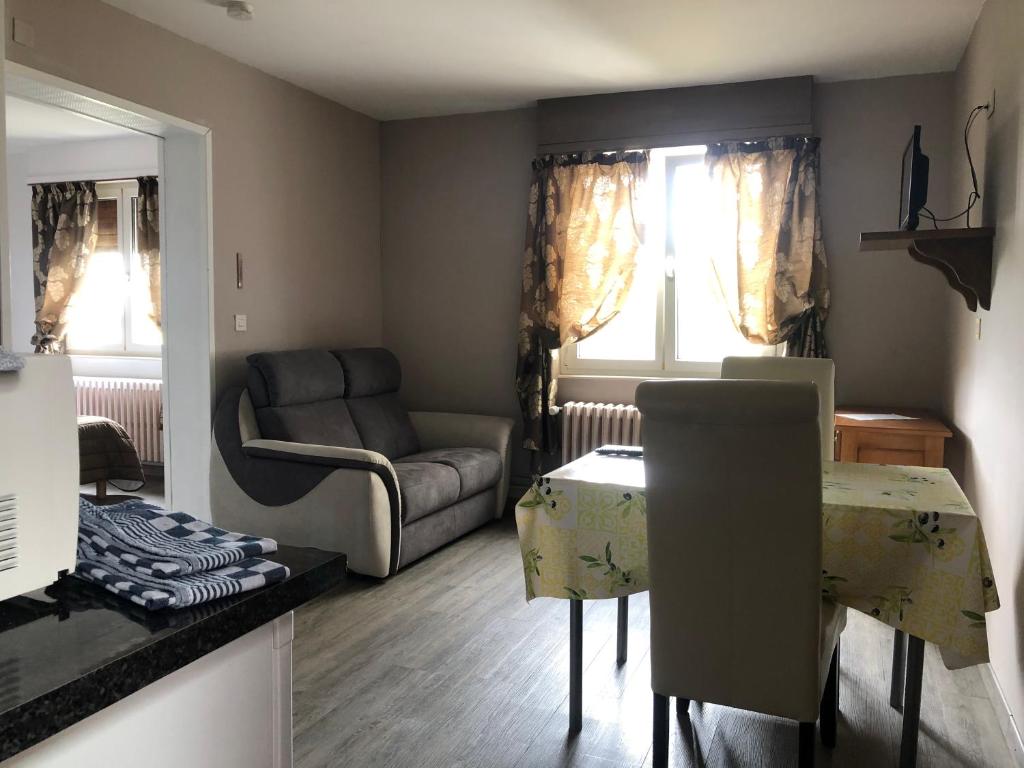 Posezení v ubytování Appartement à l'ange